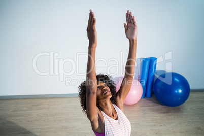 Woman performing stretching exercise