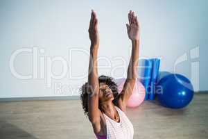 Woman performing stretching exercise