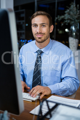 Business executive working on computer in office