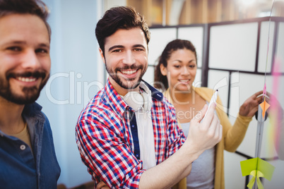 Portrait of business people at creative office