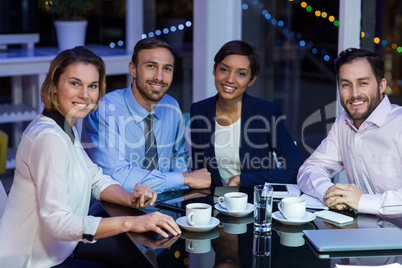 Businesspeople taking tea break