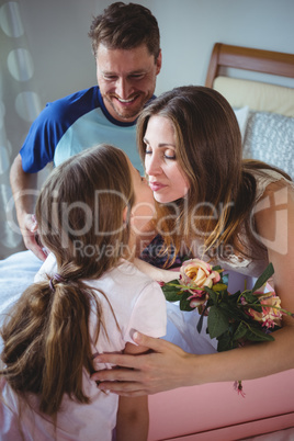 Daughter giving present to her mother