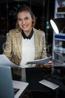 Businesswoman looking at documents