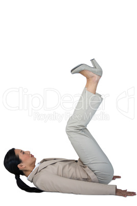 Businesswoman performing exercise
