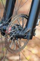 Close-up of mountain bike front wheel