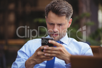 Businessman using mobile phone