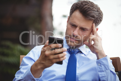 Businessman using mobile phone