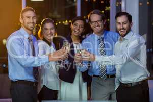 Businesspeople toasting glasses of champagne