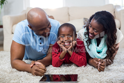 Family with digital tablet
