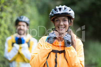 Female biker wearing bicycle helmet
