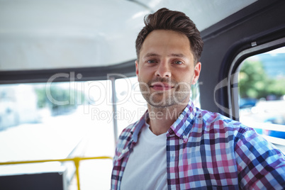 Portrait of man traveling in bus