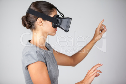 Woman using virtual reality headset Woman using virtual reality headset