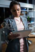 Businesswoman using digital tablet