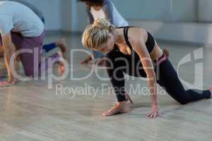 Woman performing stretching exercise