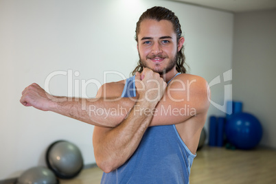 Smiling man doing aerobic exercise