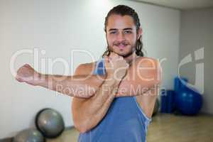 Smiling man doing aerobic exercise