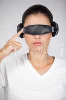 Woman using virtual video glasses