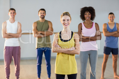 Portrait of group of people standing in gym