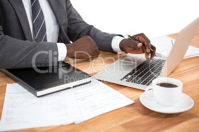 Businessman working on laptop