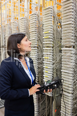 Technician using digital cable analyzer