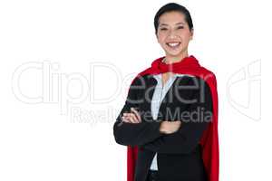Woman pretending to be a super hero on white background