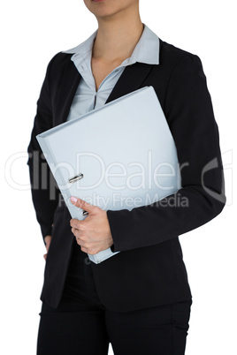 Businesswoman holding a file