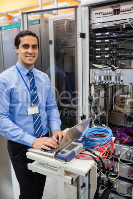 Technician working on laptop