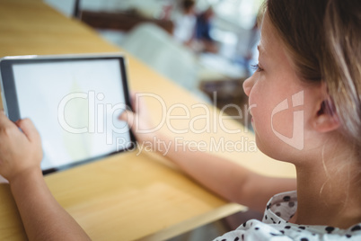 Girl using digital tablet