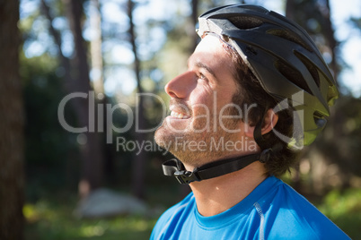 Male mountain biker in the forest Male mountain biker in the forest
