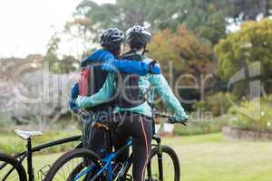 Biker couple with mountain bike