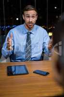 Businessman having a discussion in office