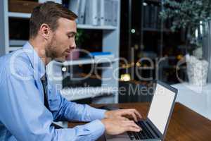 Businessman working on laptop