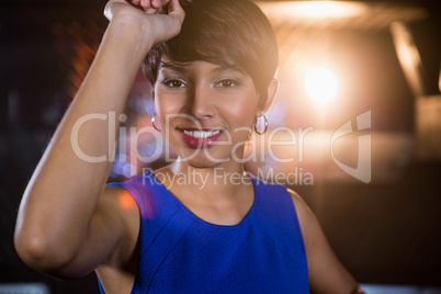 Young woman dancing on dance floor