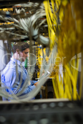 Technician using digital tablet