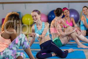 Group of women talking while exercising