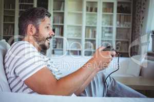 Father playing video game