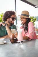 Couple looking at mobile phone