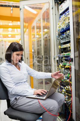 Technician working on laptop