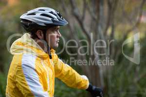 Male biker with bicycle helmet