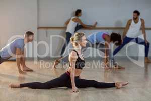 Woman performing stretching exercise