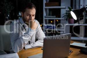 Businessman working on laptop