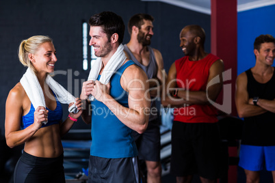 Happy multi-ethnic friends in gym