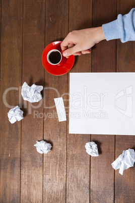 Man holding cup of coffee