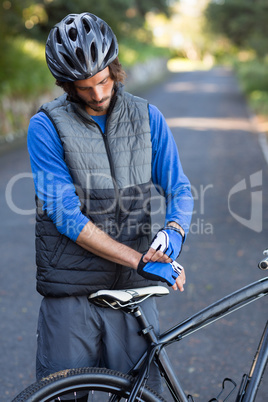 Male biker wearing sport gloves