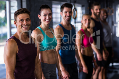 Smiling athletes in gym