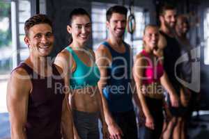 Smiling athletes in gym