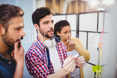 Young executive explaining strategy at creative office