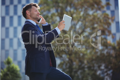 Businessman talking on mobile phone