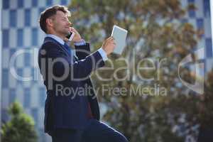 Businessman talking on mobile phone