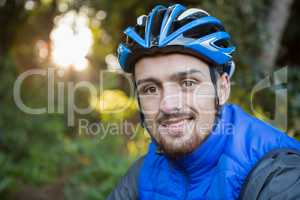 Portrait of male mountain biker in the forest